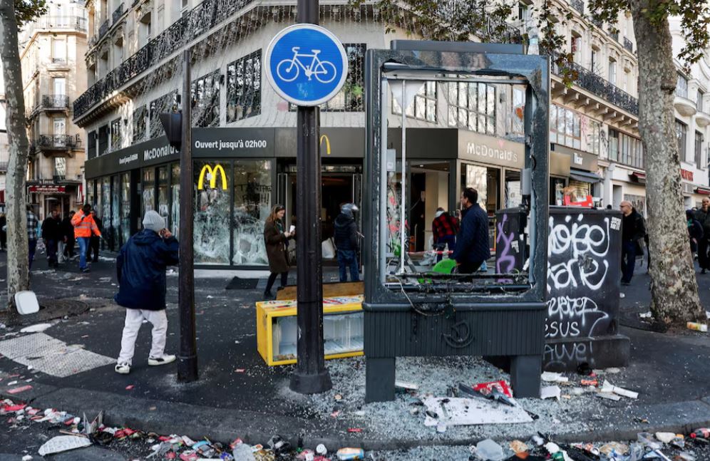 France imposes curfews in Paris and other major cities